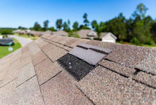 A roof repair process on a residential house in Staten Island, NY