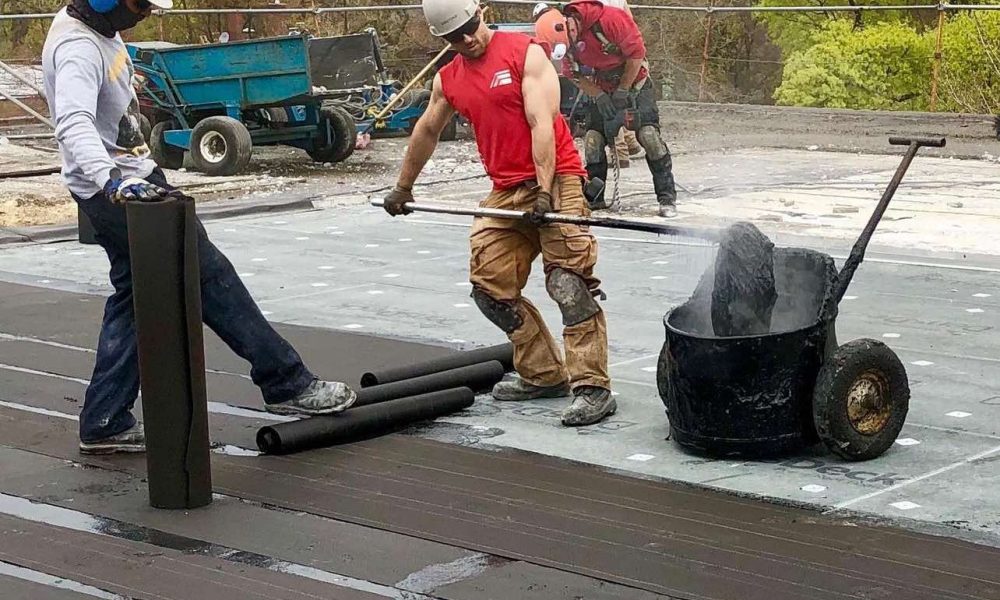 Alter Phase Roofing crew working on a EPDM Roof install in Brooklyn, NY